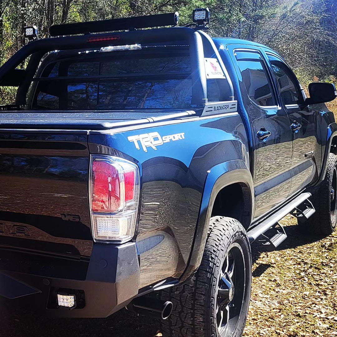 Ready to roll into the spotlight? Our Black Horse Off Road Classic Roll Bar adds style and strength to your Tacoma!